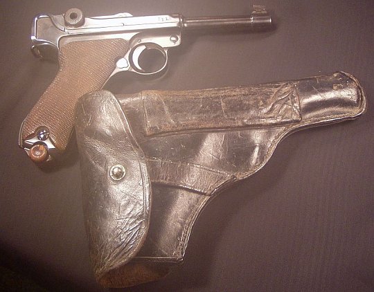 Click image for larger version

Name:	Luger and holster 002.jpg
Views:	51
Size:	102.6 KB
ID:	63887