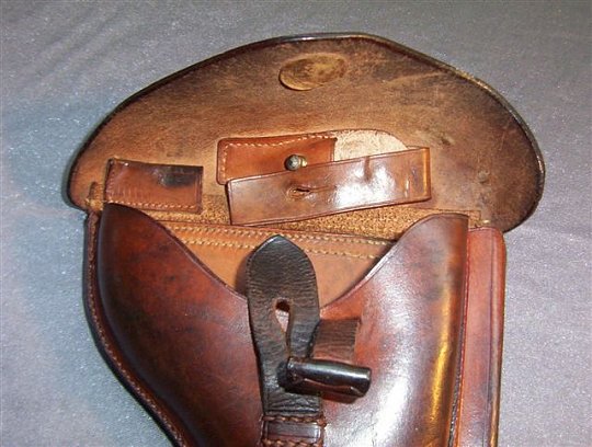 Click image for larger version

Name:	1900 Holster7comp.jpg
Views:	40
Size:	68.4 KB
ID:	72629